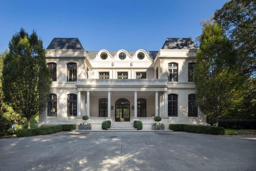 Welcome to 133 Blackland Road, Atlanta, GA 30305, a truly remarkable estate that epitomizes timeless luxury and elegance with Palladian French and Italian Architecture.   Custom built by the acclaimed Benecki Fine Homes, this residence stands as a testament to superior craftsmanship and architectural excellence in the coveted heart of Tuxedo Park, a short walk to nearby Chastain Park.

Designed by the distinguished architect Brad Hepner, with custom metal work by Atlanta artist Corrina Mensoff, this home exudes sophistication from the moment you enter. High ceilings and Palladian symmetry create an airy ambiance, enhancing the grand scale of the interiors. The main living areas seamlessly blend style and functionality, offering an ideal setting for both grand entertaining and intimate family gatherings.

At the heart of the home lies one of Buckhead's finest kitchens, designed to inspire culinary creativity. It features state-of-the-art appliances, custom cabinetry, and exquisite finishes that will delight even the most discerning chef. Whether hosting a dinner party or enjoying a quiet meal, this kitchen is sure to be a focal point of daily life.

Adding to the home's allure is the primary suite conveniently located on the main level, providing a luxurious retreat with ease of access. This serene space offers ultimate comfort and privacy, featuring lavish appointments and a spa-like en suite bathroom. The suite offers tranquil views overlooking the beautifully landscaped gardens, creating a perfect private sanctuary.

Set on over 2 acres of beautifully landscaped grounds, this gated property offers unrivaled privacy and tranquility. The expansive outdoor space includes a flat walkout pool, complemented by a stunning pool pavilion that invites leisurely afternoons and outdoor dining. This setup ensures that relaxation is always at your fingertips, set amidst meticulously maintained gardens that provide a picturesque backdrop.

Security and privacy are paramount, with the estate's masonry block construction ensuring durability and timeless appeal. The inclusion of an elevator adds convenience and accessibility to all levels of the home.

For year-round indulgence, the estate also includes a separate indoor pool and a luxurious sauna, creating a private spa-like retreat within your own home. These exceptional amenities ensure that wellness and leisure are always a priority.

Positioned in one of Atlanta's most prestigious neighborhoods, 133 Blackland Road offers unparalleled access to the best of Buckhead's dining, shopping, and cultural attractions, while providing a serene retreat from the bustle of city life.

This extraordinary property is not just a home; it's a lifestyle. Experience the pinnacle of luxury living and make this distinguished residence your own.