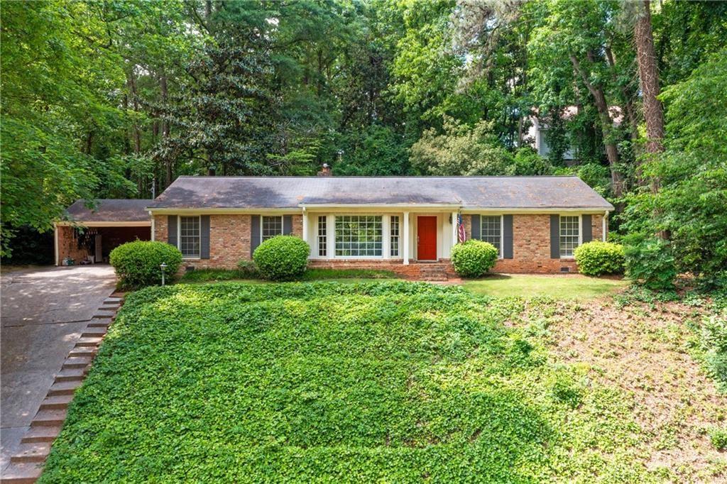 Welcome home to your sprawling ranch in popular Mountaire in Sandy Springs. Easy (1/2 mile) access to Abernathy Greenway, Sandy Springs City Center, and the Sandy offering easy access to green spaces, shopping, dining. Heards Ferry and Riverwood HS district. Updated home with all freshly refinished hardwoods & fresh paint throughout. Large formal living room with picture window showcases a serene setting on this quiet street . Den with a warm and inviting fireplace overlooking the vaulted screen porch. Formal dining room. Updated kitchen with granite countertops, stained cabinets, and opens to tiled breakfast nook. Powder room and laundry room just off the kitchen. 4 spacious bedrooms with primary en-suite bath. One of the secondary bedrooms just off the living area has plentiful built ins making it an ideal home office. Bricked terrace patio area and terraced greenspace backyard. 2 car carport with direct access to the kitchen features additional storage opportunities. This is a beautifully maintained home.