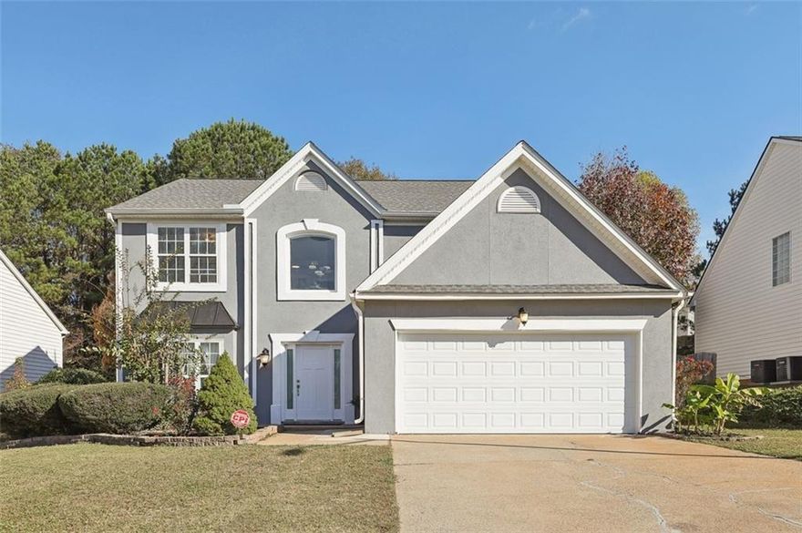 Welcome to Your Dream Home! Modern living meets comfort in this beautiful 3-bedroom, 2.5-bath home, ready for you to move in and start making memories. Freshly painted inside and out, it boasts a stunning kitchen with brand-new quartz countertops, white cabinetry, a gas cooktop, and a versatile island perfect for hosting casual meals. Stylish tile flooring flows through the first floor, while a cozy living room with a fireplace invites relaxation. Upstairs, spacious bedrooms offer personal retreats.  Step outside to a newly extended, covered deck overlooking a private, fenced backyard. Major improvements include Roof (2023), HVAC System (2023), and a NEW Garage Door(2024), NEW Oven (Jan 2025). With these updates, you can move in with peace of mind and start enjoying your new home right away. If location matters, this home is just minutes from Marietta Square, Jim R. Miller Park, schools, shopping, and dining. Its prime location offers the ideal balance of suburban tranquility and everyday convenience.  Don’t wait—schedule your showing today and make this beautiful home your own!