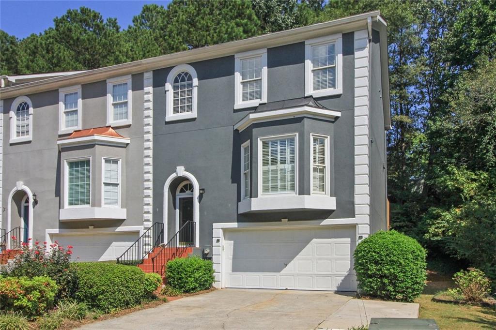 TOTAL RENOVATION of this charming and spacious Charleston Bay townhome! Enjoy the wide staircases, beautiful hardwoods, new lighting, carpet, LVP on lower level, and opened-up flow maximizing modernization and functionality. A chef's dream of a kitchen with stone counters, stainless steel Kitchen Aid appliances, custom soft-close cabinetry and plenty of storage. Notice the added lovely kitchen island/breakfast bar and bay window area bathing the room with tons of natural light. Entertain away in the generous dining area leading seamlessly into the family room with fireplace flanked on either side by appealing built-ins. Take the gathering outside to the expansive deck and enjoy a bit of Mother Nature!
A true move-in-ready delight as every room has been touched! Newly painted throughout, ALL bathrooms tastefully renovated from top to bottom. The lower level off the 2-car garage features a sizeable bedroom with en-suite bath, the laundry, and a private and serene patio area for relaxing. Two additional bedrooms are above the main living area level. Enter the primary suite through stately French doors and be wowed by its size, stylish accent wall, new carpet and tremendous spa-like bath with glass shower, bathtub, double vanities and custom cabinetry! A secondary bedroom with newly renovated en-suite bath completes the picture on this level.
This charming community is centrally located in Duluth with great proximity to Peachtree Industrial Blvd along with I-85 making commuting a breeze. Convenience to nearby Northside Hospital Duluth is an added benefit, and let's not forget the charming downtown area with all it has to offer with shops, restaurants, parks, and events.
This meticulously maintained and renovated townhome is the one to call HOME!!