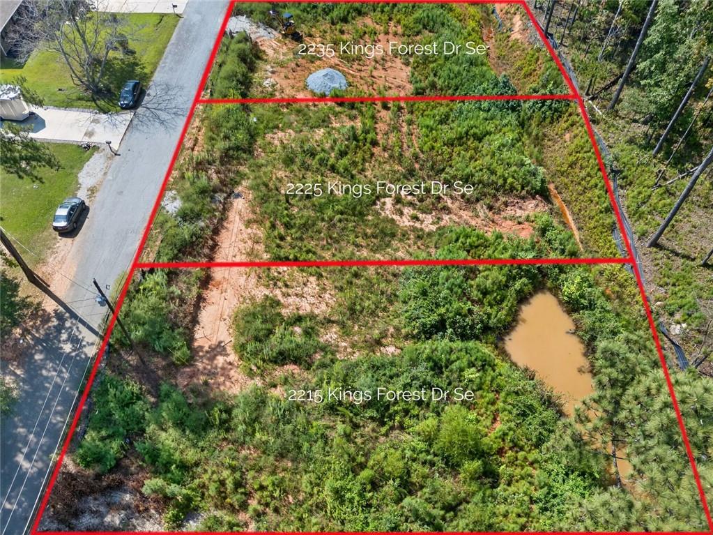 Located in the established Kings Forest Neighborhood. Residential lot partially cleared and ready to build. Lots 2215, 2225 and 2235 are available and listed separately. Can be sold together or separately. Sewer in the neighborhood and perc test on file. Sewer plans approved by county.