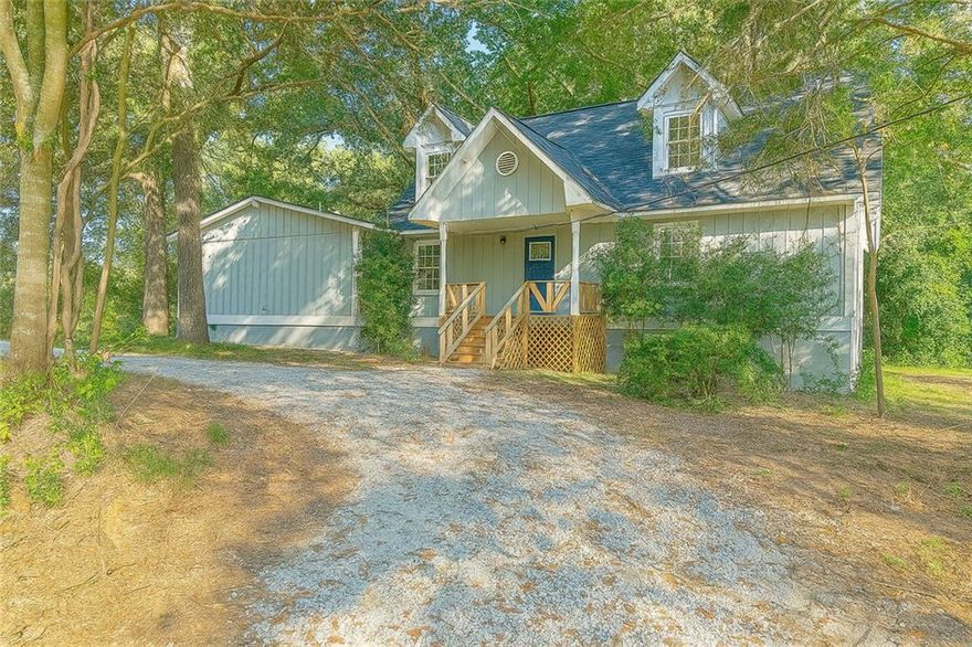 MOTIVATED SELLER! Welcome to this charming two-story residence surrounded by lush greenery, offering a peaceful retreat that’s still close to everything. Featuring a unique Teen/In-Law Suite with its own private ramped entrance, this home is ideal for multi-generational living. The suite includes a large living area, two bedrooms, and a full bath — providing comfort and privacy for extended family or guests.
Inside, you’ll find a bright, open living area filled with natural light from large windows overlooking the trees. New carpeting adds comfort throughout, while ceiling fans enhance airflow in every room. The modern kitchen offers ample cabinetry, sleek countertops, and generous workspace — perfect for everyday cooking or entertaining.
Each bedroom is spacious and versatile, easily adaptable for guests, home offices, or creative spaces. The bathrooms feature modern finishes and excellent storage. A new moisture barrier has been added for extra value and peace of mind.
Don’t miss your chance to own this inviting and versatile home that perfectly blends comfort, functionality, and natural beauty. Schedule your showing today!