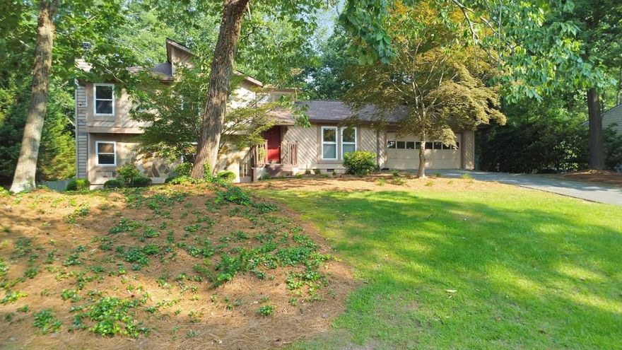 Look no further because this is the one! Welcome to this charming and well-maintained 4 bed / 3 bath split-level home in a prime East Cobb location, just minutes from the interstate and situated in the sought-after Wheeler High School district. Step inside to a bright and inviting living room featuring vaulted ceilings and a skylight that fills the space with natural light. Just a few steps down, the fireside family room offers the perfect setting for relaxing or entertaining with friends and family. The elegant kitchen is equipped with stainless steel appliances, white cabinetry, granite countertops, and a cozy breakfast area - ideal for casual meals and morning coffee. Upstairs, the primary suite offers his and hers closets and a private en suite bath. Two additional bedrooms share a hall bath on the upper level, while the lower level includes a fourth bedroom, full bath, and laundry room. The expansive back deck overlooks a private backyard with a large flagstone patio, offering plenty of space for relaxing or entertaining. Don’t miss this fantastic opportunity to own a beautiful home in one of East Cobb’s most convenient locations!