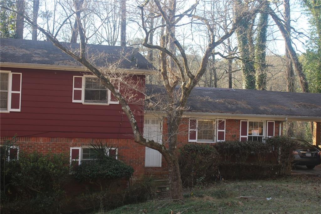 Incredible opportunity for a starter home with a lot of equity or for a savvy investor with a little TLC. Four-sided brick home with 4 bedrooms and 2 bath split level home, new Kitchen cabinets with marble counter tops, New paint and has hardwood floors all throughout, sits on a large .5Acre lot right in the heart of cascade heights. Home could definitely utilize FHA 203K Loan for the repairs financed by the lender, bring your best ideas make it your own. Close to the amenities, recreational parks, Downtown Atlanta and atlanta airport. Million dollar homes just around the corner, this home provides opportunities for great equity and increase in home value. Home has basement and sub basement with its own entrance from the backyard.