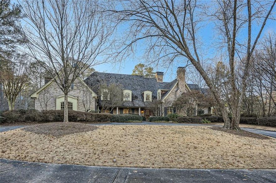 Stunning, gracious estate on a 2 acre corner lot. Welcome to this family home with all the amenities you were looking for. The main level begins in the soaring two story foyer. Straight ahead is the fireside formal living room that opens to the patio in the backyard. Down the right hallway is the gracious home office with a fireplace located just outside the primary vaulted bedroom. This beamed primary suite has a sitting area, a large walk-in closet, a second home office that could also be a second walk-in closet that leads to the gorgeous primary bathroom. Double vanities, a water closet, soaking tub and accommodating steam shower steal the show in the primary bathroom. Back in the foyer, head through the formal living room to the gracious dining room with room for 12 or more. Just outside is the kitchen. As you make your way to the modern kitchen, you will find the kitchen open to the family room on one side. The other side has a built-in breakfast area and bar. The Wolf gas range and other top of the line appliances are there to help you create your culinary masterpieces. You can talk to the chef from the cozy family room with fireplace that is open to the kitchen. This wing of the home leads through the family room to the mud room and laundry room on the way to the 3 car garage. In the family room, there is a rear staircase the leads upstairs as well as down to the entertainment level. Up the stairs you will find a smaller communal den outside of the 4 bedrooms. Each bedroom has its own en suite bath and one of the bedrooms has a secret bonus room through the closet that could be used as an art studio or even more storage. The lower level is the entertainment zone. Whether you want to pop popcorn in the kitchenette and watch a movie on the big screen in the home theatre or play pool and foosball in the game room, this home has everything you need. Plenty of storage plus a downstairs family room. Workout in the home gym or on the sport court in the backyard, and then cool off in the beautiful heated pool. Truly, a spectacular home!