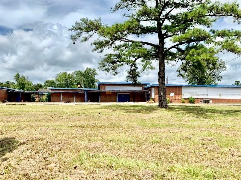 $100,000 price reduction to sell quickly. Prime opportunity for redevelopment. Property was formerly a school/daycare/neighborhood academy. Property consists of 4.07 Acres with 3 separate buildings totaling 22,810 sf. Features 10'+ ceilings in all 3 buildings. Property needs renovation, but has great bones. Would be great for a church, school, daycare, duplexes, Senior care center and more. Ample parking and room to expand. Large round about driveway with two access points makes for easy entry and exit.