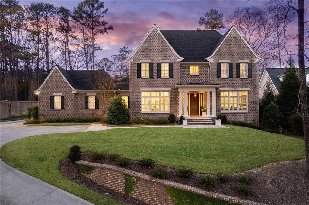 Only a few steps from Chastain Park, this is the house everyone is looking for!! Less than 4 years old, this Crestar built home has it all! Open floor plan, high ceilings, flat walk out yard with beautiful pool! The entrance hall is flanked by a large dining room on the left and a beautiful living room on the right. The back of the house is filled by the kitchen and fireside family room which opens to the covered porch, pool and fire pit. Hidden office, mudroom, walk in pantry and wet bar are found at the back of the kitchen. Garages open into the kitchen area. There is also an ELEVATOR SHAFT. Kitchen has 2 dishwashers, Wolf 8 burner stove with griddle, marble counters, SubZero refrigerator, Miele coffee maker. Upstairs is a large primary suite with 2 walk in closets and spacious bath! In addition, there are three en suite additional bedrooms and a laundry room. Terrace level has an additional en suite bedroom, wine cellar, family/media room and bar area perfect for entertaining. The kitchen has sliding windows that open to the covered porch and fireplace. This leads to the pool with spa and fire pit. There is a half bath in the one car garage which serves as a pool bath.