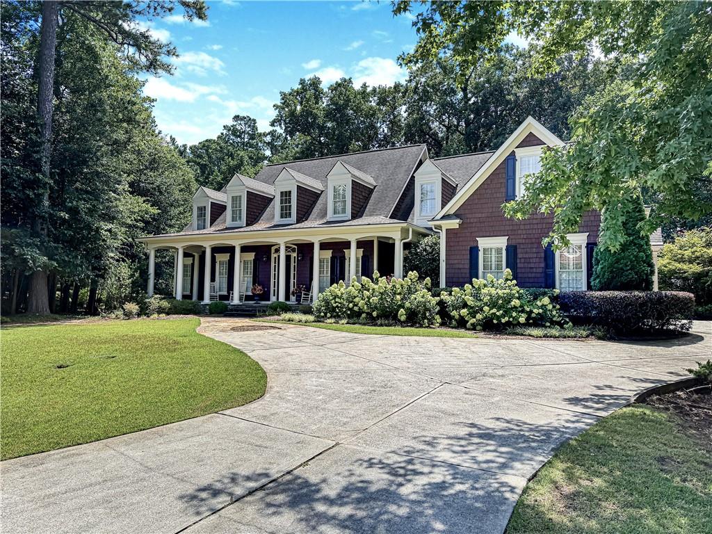 Exceptional Value on a Private Acre in Kennesaw
Priced well below similar custom homes in the area, this property offers an incredible opportunity to own a spacious, well-designed home on a full acre of private land. Tucked away in a peaceful, wooded setting, you’re still just minutes from shopping, dining, and easy freeway access — the perfect balance of convenience and serenity.
A long driveway leads to a three-bay, three-car garage, offering plenty of parking and storage. Step inside to find soaring ceilings, wide hallways, and an open, airy layout that feels welcoming from the moment you enter. The owner’s suite is conveniently located on the main level and features dual closets, a large soaking tub, and a separate walk-in shower.
The heart of the home is the well-appointed kitchen, with ample counter space, a large center island, and room for more than one cook. It's open to a generous keeping room/family room and a spacious dining area — ideal for entertaining or everyday living. Beautiful hardwood floors, crisp white trim, and large windows fill the first floor with light and warmth.
Your great room features a dramatic two-story wall of windows with wooded views — and since the land behind you is part of your property, you’ll enjoy privacy with no risk of future development.
Upstairs, you’ll find three additional bedrooms, each with charming bonus nooks perfect for playrooms, hobby spaces, or expanded living areas.
The expansive finished basement offers endless possibilities — a large recreation room, home office, or media space — with its own private entrance onto a stunning flagstone patio. With tall ceilings, a separate HVAC system, and access to mechanicals, there’s also plenty of unfinished space to create additional bedrooms, a full kitchen, or in-law suite. It’s the perfect setup for multi-generational living or future expansion.
Additional highlights include a newer roof, fresh exterior paint, and three well-maintained HVAC systems. The backyard is nicely landscaped for easy upkeep, and the gentle slope around the home provides future potential for a second private entrance to the lower level.
Located near Kennesaw Mountain National Battlefield Park, downtown Marietta, and the Marietta Country Club, you’ll enjoy abundant recreation, shopping, and dining just minutes away.
Come see this unique opportunity — a peaceful retreat in the heart of Kennesaw. With the savings on purchase price, you can invest in making this home truly your own.