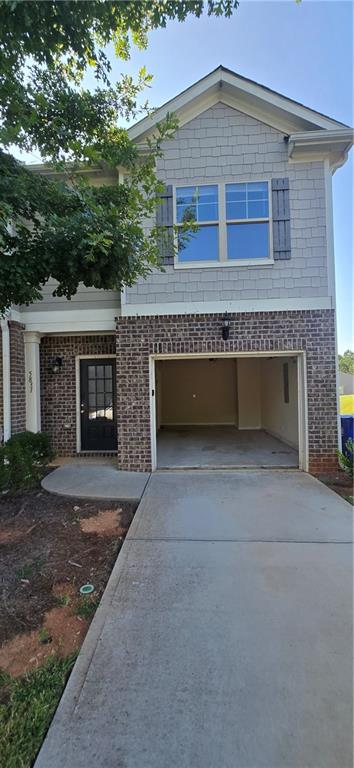 Looking for the perfect rental, look no further! This cozy end unit features 3 bed/3.5 baths, an open concept kitchen/family room combination, LVP flooring, COuntry white cabinetry, granite countertops, and stainless steel appliances. Upstairs, you'll find the primary bedroom with en-suite bathroom, two additional secondary bedrooms and a hall laundry complete with a washer and dryer. The backyard is equipped with a patio, providing the perfect space for outdoor gatherings and entertaining. The property also includes a one-car garage, with additional parking available in the driveway. Situated with close proximity to I-20, I-285, and several local eateries.