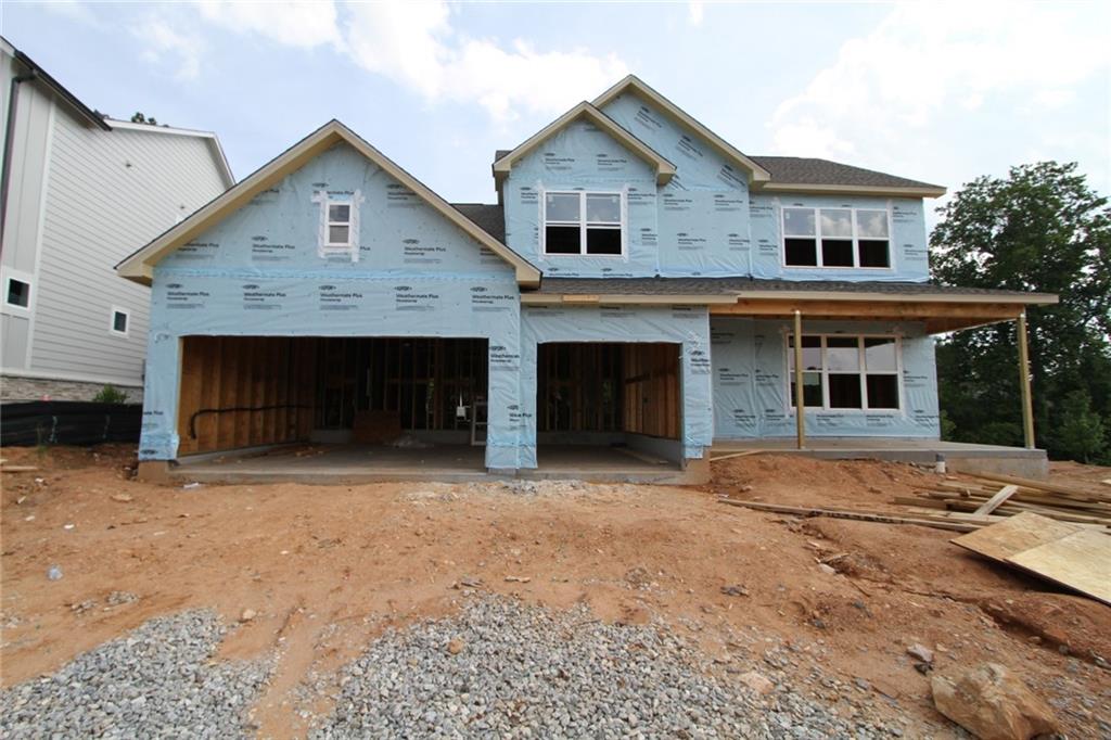 Welcome home to The Worthdale by Award Winning David Weekley Homes. Home boasts an Owners retreat and laundry on mail level with huge walk in closet. Beautiful chef kitchen with coffee bar area. The covered large patio off of the kitchen makes for an entertainer's dream! There is no lack of natural light and private wooded lot behind you. The upstairs offers a huge retreat and an additional 3 bedrooms and 2 full baths. Come see David Weekley homes today! This is what dreams are made of!