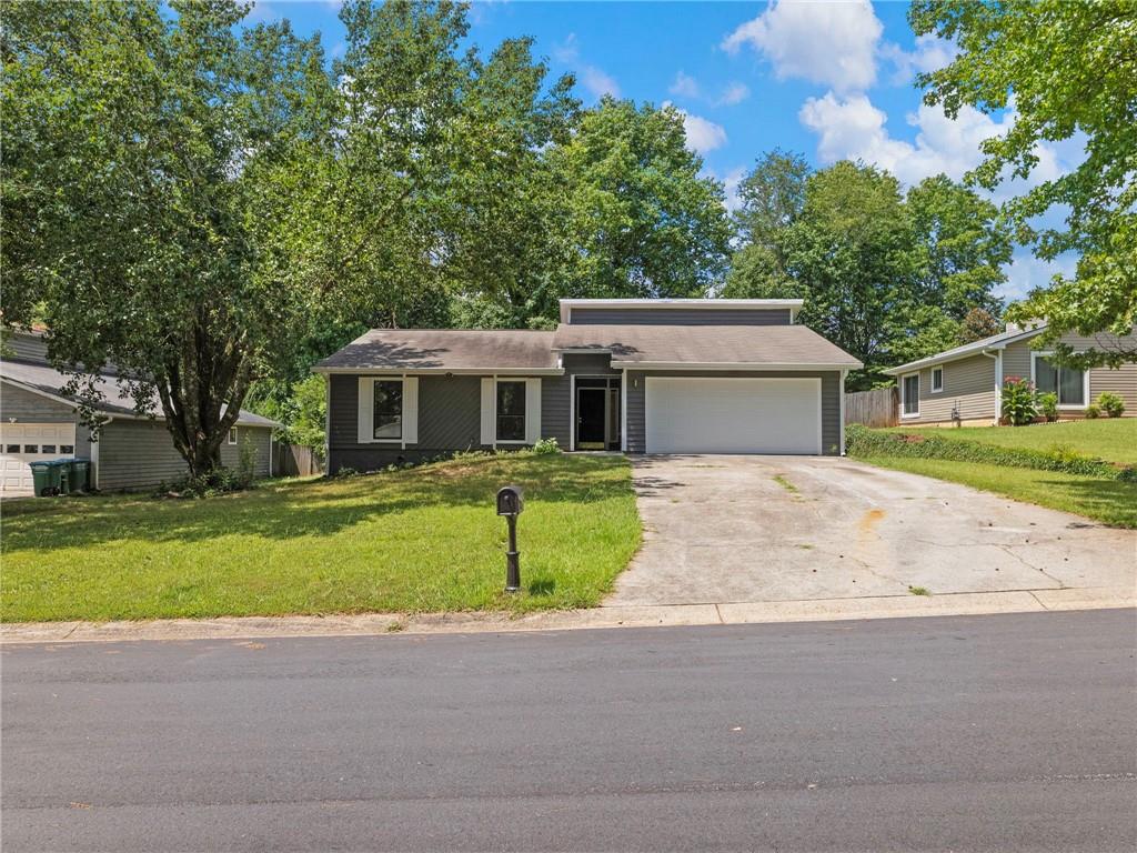This stunning one-level ranch in Snellville is a move-in ready gem, featuring 3 bedrooms and 2 fully updated baths with high-end finishes throughout. The open, bright layout boasts quartz countertops, brushed gold fixtures, shaker cabinets, and brand-new stainless appliances, while the luxurious master bath impresses with floor-to-ceiling tile and a new vanity. Freshly painted inside and out, the home sits on a quarter-acre lot with a spacious new deck, perfect for entertaining. Designed for comfort and style, this beautifully modernized ranch offers effortless living—no stairs, just sleek, turnkey perfection. Don’t miss this rare find!