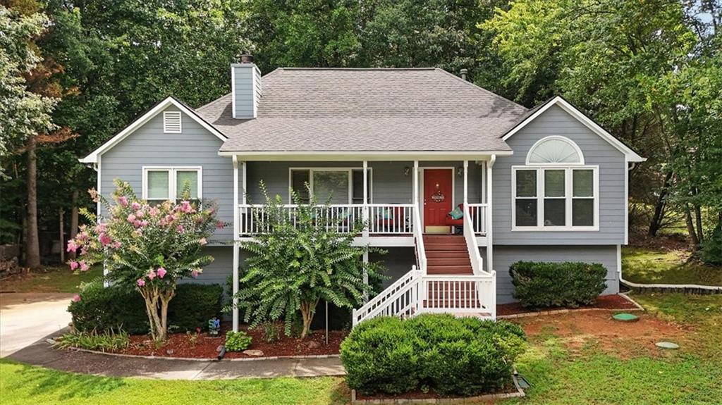 Discover this stunning 3-bedroom, 2-bath home tucked away in the sought-after Legacy Park community of Powder Springs. Offering the perfect balance of charm and modern updates, this home welcomes you with soaring vaulted ceilings in the family room, a cozy wood-burning fireplace with gas starter, custom built-in bookshelves, and beautiful LVP hardwood flooring. The spacious layout includes a separate dining room, a large master suite with 2 walk in closets, and a bright kitchen with tiled floors. Downstairs, you’ll find a versatile drive-under basement featuring a finished bonus room/ possible 4th bedroom, a stubbed bath, and an oversized 3-car garage — ideal for storage, hobbies, or a workshop. Step into the screened-in porch to enjoy year-round comfort and take in serene views of deer, squirrels, and even the occasional fox, or entertain guests on the expansive deck. Recent upgrades provide peace of mind with new exterior paint (2023), a brand-new roof (2018), and new front windows. Best of all, this home sits in a quiet, well-established neighborhood with no HOA, giving you the freedom to truly make it your own while staying close to schools, parks, shopping, and dining. This is more than just a house — it’s a forever home where comfort, care, and convenience come together.