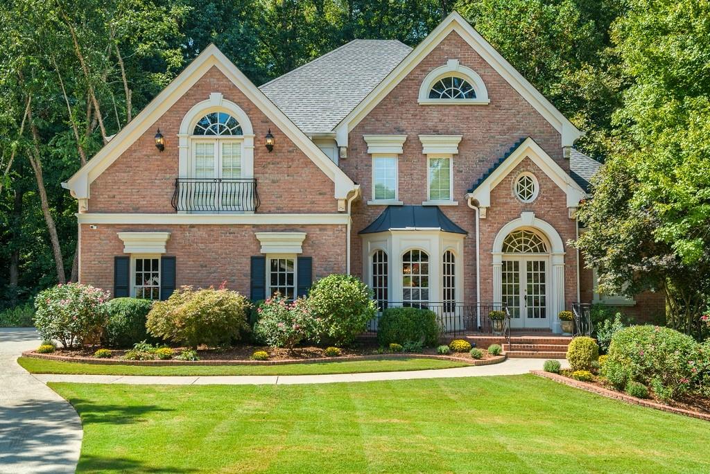 High ceilings, natural light, an open floor plan and flat yard are just a few of the highlights of this cul-de-sac home. Walk to the nearby park, restaurants and shopping! Quality brick construction. Prof. Kitchen w/custom cabinetry, stone tops, Dacor 6 burner range, Bosch DW, GE Monogram built-in fridge & microwave drawer. Owner's suite on main w/2 big walk-in closets, bath and separate shower. 3 Bedroom Suites upstairs w/walk-in closets & en suite baths. Fin.Terrace level has Rec, Media & Exercise Rooms, bedroom suite & lots of storage! Popular Smith Elementary.