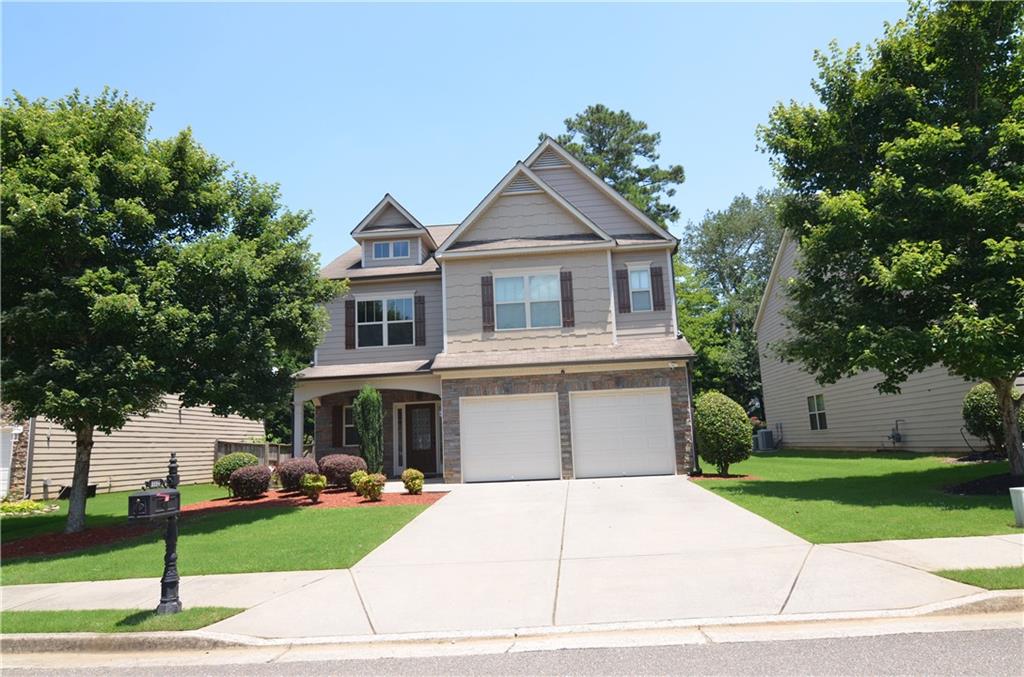 Great location and Top Forsyth Schools! 1.3 miles to Exit 13 of 400. Minutes to Fowler Park, Big Creek Greenway, The Collection, and The Market Place. Very spacious inside with 5 BRs and 4 & 1/2 Baths, hardwood throughout the main level, granite countertop and island in Kitchen, separate dining room with coffered ceilings, a large guest bedroom and 1 & 1/2 baths on main. 9 ft ceilings at both levels. Upstairs are 4 additional bedrooms, 3 full baths, and laundry room, including the master bedroom with trey ceiling, master bathroom with double vanities, garden tub and a separate shower in the master bathroom. Common area with outdoor fireplace. Available 7/15. Showings start 1pm 6/29 and after. (Interior photos to be updated)