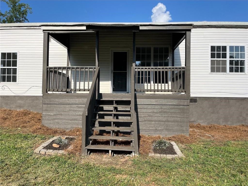 Come home to a spacious 4-Bedroom Home on Private 2+ Acreage in Villa Rica! (Rectangular shape lot for dimensions look up tax records)
Welcome to 143 Raven Rd—this move-in ready charming 4-bedroom, 2-bath manufactured home offers over 1,800 square feet of living space nestled on a peaceful lot in the heart of Villa Rica. Originally built in 1968, the home has been fully renovated, fresh paint and floors throughout. Well-maintained and offers a functional layout perfect for families, investors, or those looking to enjoy the quiet of country living while staying close to town conveniences.
Enjoy a large kitchen and dining area, generous living spaces, and ample bedroom sizes. The property offers plenty of room for gardening, outdoor entertaining, or expansion opportunities. With easy access to I-20, shopping, and dining, this is a great value for anyone seeking space, privacy, and potential.
Spacious Shed located in property for handy man tools or any projects
Property sits on a permanent crawl space foundation, titles have been retired. Could possibly go FHA
Don't miss out—schedule your showing today!