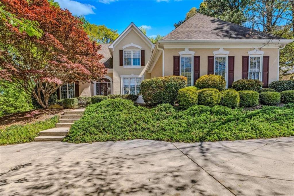 Fantastic, well maintained home inside the gates at Eagle's Landing Country Club Community. This well kept home has been occupied by the same family for the last 33 years and is ready for new owners. With almost 3,000 finished square feet, plus an unfinished basement this home features an open floorplan with a master on the main, formal living room with soaring ceilings, formal dinining room, spacious kitchen (loaded with cabinets and newer appliances) open to the eating area, den with vaulted ceiling and fireplace, lots of windows and endless possibilities to make this home your own. This master bedroom has a separate entrance to the deck and the bathroom features a separate shower, walk-in whirlpool tub, and closet with built in shelving system. Upstairs has 3 additional spacious bedrooms and downstairs has a full unfinished basement with additional finished closet. Need a place to park that golf cart? No problem with a ramp to drive right into the basement. New carpet has just been installed, most of the interior freshly painted and the hardwood floors have been refinished. The deck was repainted last year and is overlooking a beautiful private backyard with mature landscaping. This fantastic home is located in a gated community with an option to join the country club with access to a pool, golf course, tennis and pickle ball courts. This home is now vacant and available for a quick closing. Bring your family and enjoy the good life! Owner is a licensed Realtor in the state of Georgia.