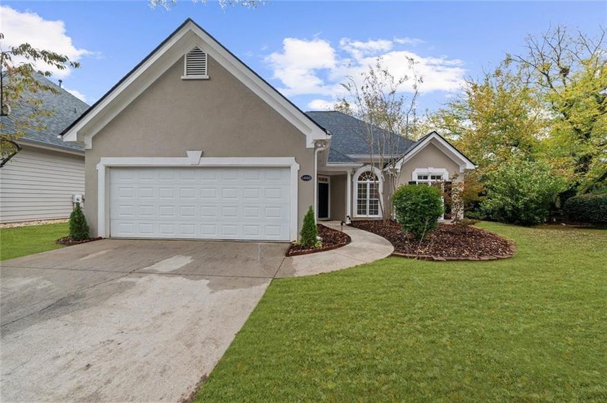 Welcome to River Farm! Located in the highly sought-after Johns Creek area with top-rated schools and easy access to shopping, dining and highways. This beautiful stepless ranch sits on a cul-de-sac lot which backs up to the River Pines Golf Course. This home features a bright open floor plan with vaulted ceilings, rounded bullnose edges on the walls and skylights that fill the home with tons of natural light. The kitchen offers granite countertops, brand-new stainless steel range and dishwasher, and overlooks the cozy fireside living room along with an eat in kitchen and separate dining room.  The spacious primary suite provides comfort and privacy, while the low-maintenance exterior and private backyard make it ideal for easy living. New roof (2 years old) and water heater (3 years old) offer peace of mind.  HOA-covers water, sewer, trash, two community pools and a rentable clubhouse as well as access to walking trails along the Chattahoochee River. This move-in-ready gem combines comfort, convenience, and charm in one perfect package.