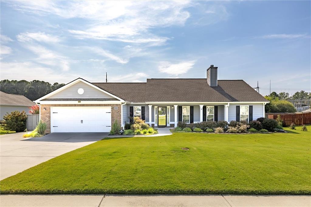 Turn-key RANCH HOME in a well-kept neighborhood! This charming home with a rocking chair front porch offers a welcoming layout with Audacity laminate flooring throughout, FRESH INTERIOR PAINT, and UPGRADED LIGHT FIXTURES, CEILING FANS in every room, and a HUGE MASTER CLOSET. The living room features BUILT-IN CABINETS by the FIREPLACE, and the garage has added insulation plus an insulated door for ENERGY EFFICIENCY and SOUND REDUCTION. The laundry room includes added cabinets for EXTRA STORAGE. Step outside to enjoy the EXTENDED PATIO with roll-down screen on the covered area-perfect for relaxing or entertaining. Further back in the yard, you'll find a PERGOLA offering another great spot to gather or unwind. The backyard is fully FENCED and beautifully landscaped with a pecan tree, peach tree, grapevines, blackberry and blueberry bushes, dogwoods, azaleas, hibiscus, daylilies, crape myrtles, and black-eyed Susans. A GREENHOUSE, IRRIGATION SYSTEM, and a 12'x22' SHOP WITH LOFT complete the outdoor space. Additional updates include TINTED STORM DOORS, smoke and carbon monoxide detectors, and attic insulation over the garage. This peaceful neighborhood is just one street, offering a quiet and friendly atmosphere.
Ask about NO DOWNPAYMENT options.