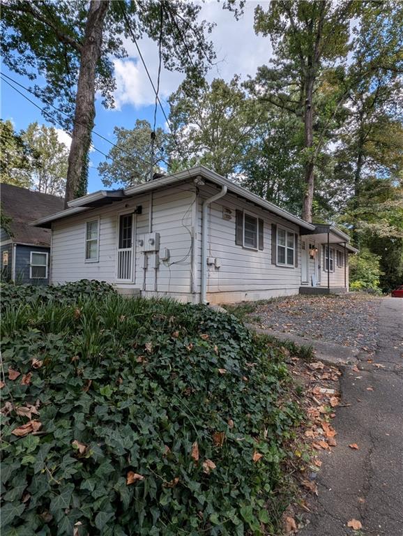 Amazing central location across the street from the Beltline at Bobby Jones/Bitsy Grant Recreation center. Minutes to Piedmont Hospital medical community, as well 1/4 mile from the Northside Drive/I-75 access. Charming 2 bed 1 bath duplex is quiet and move-in ready. Hardwood floors, paint and updated touches make this a great place to call home. Stainless Steel appliances, gas stove, granite countertops, hurry! Private deck off the rear and a full laundry is located in the basement with secure dry storage for this home. Off street parking. Sorry this home does not qualify for ANY vouchers. Showings begin Sept 22.