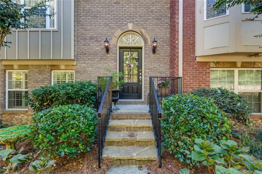 Beautiful move-in ready 4 bedroom 3 1/2 bath Townhouse within walking distance to all fantastic shops, restaurants, events and parks in Historic Norcross.  Open floor plan features LVP floors, kitchen w/ tons of cabinet space, stainless steel appliances, separate pantry, breakfast area, and island. Bright great room with marble fireplace surround. Primary suite on the upper level features double trey ceilings, two walk-in closets and a spacious bathroom with soaking tub and double vanity. One bedroom has been turned into a custom built art room/office, but can be returned to the 4th bedroom if needed.The lower level features a bedroom and full bath perfect for guests or roommate. The home also features a deck with ample space for a dining table and additional seating. Very well maintained and move in ready. Location! Location! Location!
