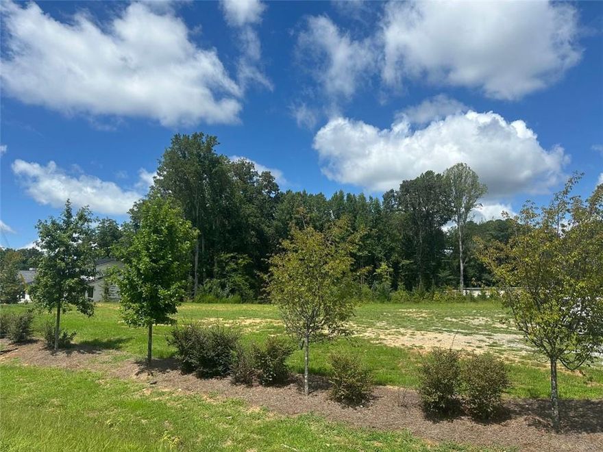 This prime location Alpharetta land lot is exactly one mile northwest of GA-400 and sees a TON of vehicle traffic on a daily basis. This property is already cleared, level, and has been surveyed and had a Phase 1 environmental study completed. Zoned CBD, this +/- 1.3 acre parcel is ready for a business to develop.