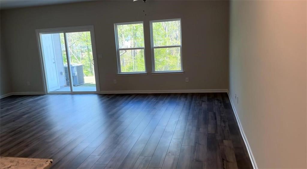 3 bed 2 1/2 bath Town House available for rent. At Last, This Is What You've Been Searching For!! Energy-efficient home! Relax and enjoy the big game from the comfort of the second-story loft. Down the hall, the primary suite features dual sinks and a large walk-in closet. Downstairs, the kitchen island overlooks the great room and dining area with White cabinets and Cotton White Granite. Hardwoods throughout the main level, privacy backyard, wonderful elevated scenic from the house. The Woods at Dawson offers two-story townhomes featuring the latest design trends. You''ll enjoy proximity to shopping and dining in Dawsonville plus convenient access to GA-400. Future amenities will include pool and cabana. Known for their energy-efficient features, our homes help you live a healthier and quieter lifestyle while saving thousands of dollars on utility bills. walking trail, walking distance (0.3 miles) to the North Georgia outlet mall and great restaurants. Elementary and Middle schools are just a mile away. Lawn care is included. Turn the key. Enter. Smile. Repeat every day. Renter responsible for all utilities (gas, electric and water). Renters insurance is required. No smoking.