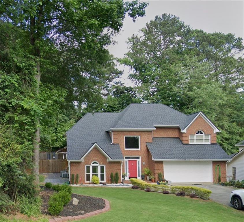 Spacious upgraded home has open concept with a two-story entry with formal Living Room and formal Dining Room. Across the rear of the home is the Family room with fireplace; open to breakfast area & kitchen with upgraded custom cabinets and granite countertops; Hardwood floors throughout Main level. Oversized staircase leads to the Upper level which includes generous master suite with oversized bath including whirlpool tub and separate walk-in shower; 3 additional large bedrooms and hall bath complete the upper level; main floor laundry room with Washer & Dryer. Lawn maintenance included.