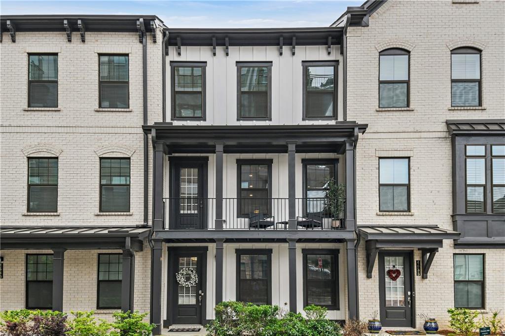 GORGEOUS recently built townhome in the highly desirable West Village community in Smyrna. This 3 bedroom 3.5 bath townhouse not only offers a VERY low maintenance lifestyle with the HOA responsible for ALL exterior, but it also offers easy walkability to shops, nail salons, restaurants, and Starbucks! This beauty is situated in a quiet street, providing a peaceful retreat from the hustle and bustle of city life, yet still close enough to enjoy all that Atlanta has to offer with low Cobb county property taxes. The interior offers the following upgrades: soft close cabinets, 2 ovens and microwave, quartz countertops instead of granite, bookshelves with cabinets next to fireplace perfect for hiding clutter, hardwood floors on all high traffic areas, and the best feature of all.... a covered balcony!!! You can enjoy outside in the front of the house or the back patio. Speaking of back patio, this unit offers the privacy greenery and mood lighting making it perfect for smores on a summer evening. Don't miss out on this unit that comes with a very fun lifestyle! Your tomorrow is someone else's today! ***NOT VACANT****MUST MAKE APPOINTMENT**