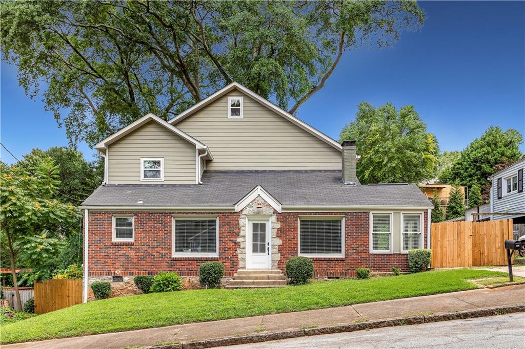 Located in Grant Park, this home is a charming blend of timeless character and cozy living with the convenience of walkability to the Beltline and everything Grant Park has to offer. With 4 full bedrooms and 3 bathrooms across two levels, plus a bonus space offering flexibility for a home office, reading nook, artist space or music room, the layout offers flexibility for every lifestyle and it’s the kind of space that adapts to your life’s changing rhythms.
From the moment you step inside, this thoughtfully updated home invites you to slow down and settle in. Sunlight pours in through the oversized windows into the cozy living space, where a rich red brick fireplace anchors the room in warmth and comfort. The seamless flow from the living room into the dining nook and kitchen creates an inviting layout that’s perfect for both quiet mornings and lively gatherings.
The kitchen features white shaker cabinetry, subway tile, and stainless steel appliances, including a gas range, that come together in a clean, modern palette. From the kitchen, the home flows naturally towards the covered back deck.
Upstairs, a private primary suite creates a peaceful escape, complete with a large walk-in closet and en suite bath. The additional upstairs bedroom is perfect for your family or guests or a roommate setup as it also includes an en-suite bathroom. Downstairs, two additional bedrooms sit just off the main hallway and share a full bath—great for kids, visiting friends, or a home gym. Out Back, a covered back deck and the fenced-in backyard is ideal for pets, play, and/or relaxing.
Located just blocks from multiple BeltLine entrances, Grant Park, and The Beacon, you’ll love the lifestyle this home affords. Wake up and walk to your favorite coffee shop, take your dog for a stroll through historic tree-lined streets, and spend weekends exploring the nearby farmers market, breweries, or restaurants. Whether you’re biking the BeltLine or relaxing on your back deck, life here offers the perfect balance of community, convenience, and charm.
462 Kendrick Ave SE is more than just a home—it’s a lifestyle, a neighborhood, and a feeling. Come experience it for yourself.
NOTE: Taxes do not reflect Homestead Exemption
