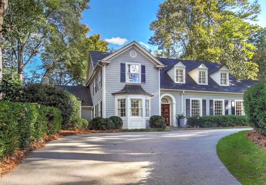 Wonderful, Norman Askins designed, cape cod, sneaky big home. Gorgeous flat, walkout back yard, renovated white marble kitchen that is off family room, enormous dining room that is perfect for entertaining. Large bonus playroom upstairs with renovated laundry room off of it, finished basement with slate floor and wet bar. Beautiful master bedroom on the main floor with 10 foot ceiling and a lovely renovated white marble bathroom. 4 additional very large bedrooms upstairs with 3 white marble renovated bathrooms. This is a perfect family house near many wonderful schools!