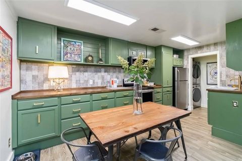 Photo of 104 GRANVILLE Court #104, Atlanta, GA 30328 (MLS # 7666564)