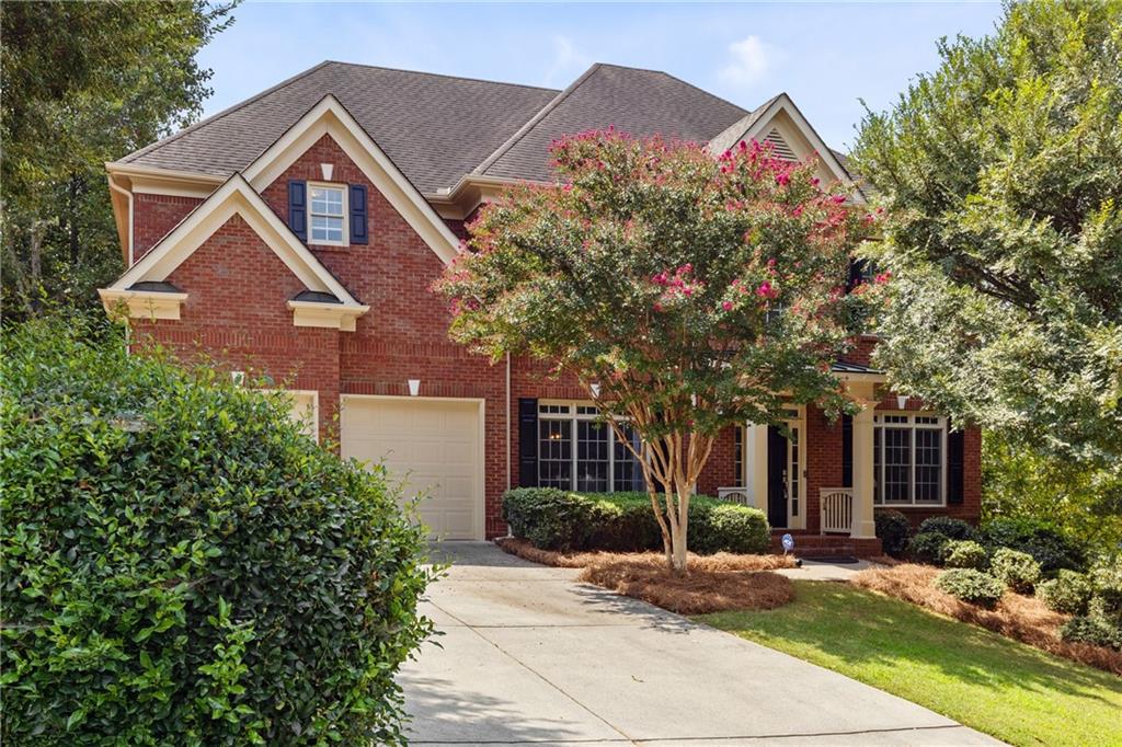 Homes in this community rarely come on the market and this one is truly special! One of the biggest floorplans in the neighborhood, this home is perfectly situated on a corner lot with a fully fenced, private yard, and offers space, style, and comfort inside and out.
Step inside to find freshly painted interiors where creamy white walls pair beautifully with rich dark hardwood floors, creating a warm yet sophisticated backdrop throughout the main level. From the moment you walk in, you can feel the quality. This is a truly well-built home designed to stand the test of time. A spacious guest suite with a full bath on the first floor provides flexibility for visitors or multigenerational living.
Upstairs, you’ll find four oversized bedrooms, each with direct access to its own bathroom. An ideal layout for convenience and privacy. The primary suite is a retreat in itself, featuring a sitting room with fireplace and a spa-like bathroom complete with heated floors.
The incredible, fully finished terrace level feels like a third floor thanks to soaring 10-foot ceilings. It includes a full kitchen, big bedroom with full bath, and multiple spaces perfect for a home gym, media room, or playroom. It also has an enormous storage room with high ceilings that spans the entire length of the garage.
With thoughtful details, solid construction, and a rare combination of privacy and convenience, this Johns Creek gem has everything you’ve been searching for!