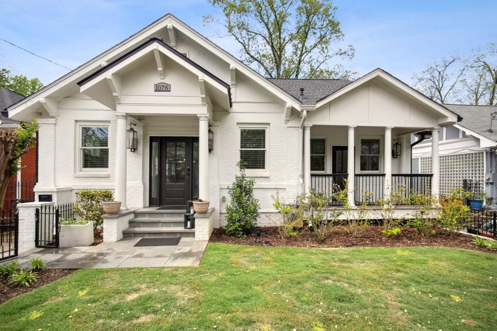 Live on the Beltline at Piedmont park in a fabulously fully renovated home with a private entrance off a quiet side street! This luxurious home is the perfect mix between modern and traditional and located steps away from all the action of midtown and Virginia Highlands. The main master is located on the 1st level and it has a private laundry room, spa inspired bathroom, oversized planned closet, flex space that is perfect for a seating room or office and amazing midtown skyline views. The second master is a true oasis on the second floor. This is a very private floor with a bathroom, office space, seating room and private balcony that overlooks the city. This home also provides a spacious living room, dining room kitchen area on the main level with hardwood floors throughout, Viking appliances, custom luxury cabinetry and so much more.