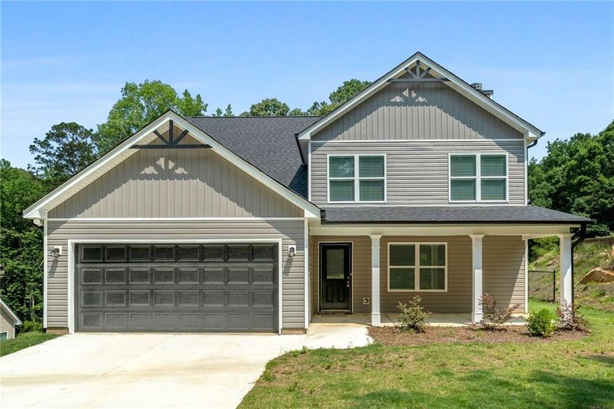 Discover this stunning 3-bedroom, 2.5-bath home with a spacious 2-car garage, thoughtfully designed for comfort and style. The kitchen features granite countertops, a large island, and modern shaker-style cabinets. Enjoy the blend of luxury vinyl plank and carpet flooring throughout, along with a generous walk-in closet, double vanity, and a cozy fireplace. The home is topped with durable 30-year architectural shingles and boasts a beautifully sodded front yard.

Nestled in the sought-after Turtle Cove community on Jackson Lake, you'll have access to top-tier amenities including golf, swimming, tennis, a restaurant and lounge, scenic beaches, and convenient boat ramps. This home truly offers the best of both relaxation and recreation.