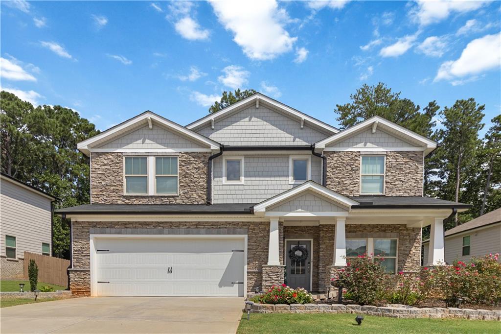 Welcome to 4377 Bethany Manor Drive! This spacious 5-bedroom, 3-bath home features an impressive two-story foyer that opens into a gourmet kitchen and open-concept living area, perfect for entertaining. Enjoy two versatile flex spaces on the main level plus a large loft upstairs ideal for a media room, playroom, or home office. Nestled in desirable Bethany Manor, this home offers both comfort and convenience with easy access to The Shoppes at Webb Gin, Downtown Snellville, dining, parks, and more. Schedule a viewing today!