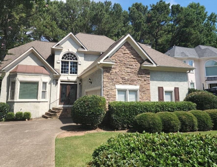 Beautiful golf villa in Towne Lake Hills East! Hard to find 5 bedroom home with owner's suite on the main. Finished basement. Huge double deck overlooking the golf course. Excellent location and schools!