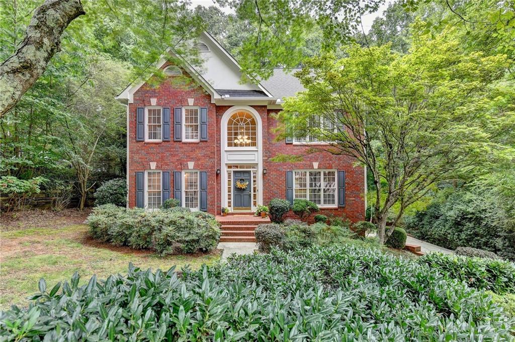 Discover your perfect retreat in this spacious 4-bedroom, 2.5-bath home on a quiet cul-de-sac in the well-maintained Saratoga Park subdivision.
The heart of the home features a generous kitchen with an eat-at bar and double oven, flowing into a bright bay window dining area that opens to the family room. Built-in shelves and cabinets flanking the fireplace add charm and storage to the family room.
Newer backyard deck off kitchen/family room overlooks a private, wooded backyard where a variety of birds and the occasional deer create your own nature sanctuary.
Separate formal living and dining rooms at the entrance to the home offer flexibility for office or other living areas. Laundry is conveniently located on the bedroom level. The finished basement provides valuable flex space perfect for a playroom, home gym, or extra storage.
Community amenities include a refreshing pool and tennis courts – perfect for neighborhood gatherings and staying active. Just minutes away from top-rated schools, parks, shopping, and dining, plus the area's rich variety of cultural activities and events. Easy access to I-85, Highway 78, and State Route 316 puts you close to Coolray Field, Aurora Theatre, and vibrant downtown Lawrenceville.
This rare find delivers the perfect blend of community charm, close-by amenities, yet still feels like your own private sanctuary.