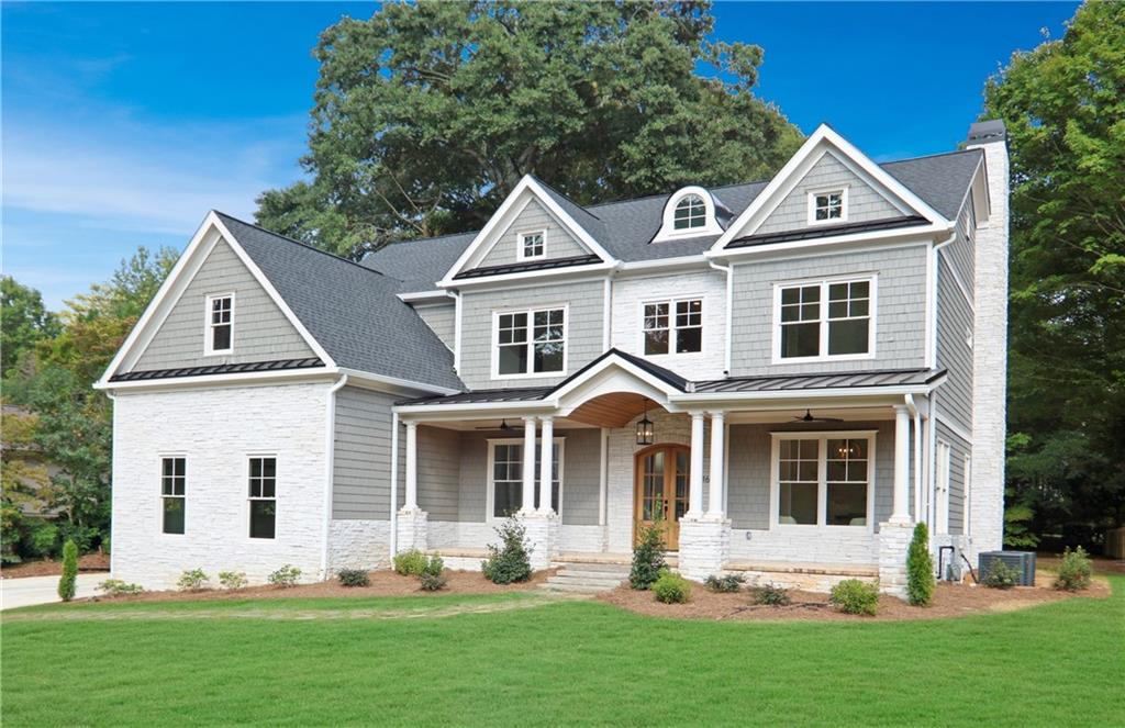 Perched gracefully on a .7-acre lot along the desirable stretch of Oak Grove Road, this stunning new build offers the perfect blend of timeless charm and modern luxury. Just a short stroll to Oak Grove’s beloved shops and restaurants, the home’s stately curb appeal is enhanced by its columned front porch, cedar shingles, and tongue-and-groove ceiling details. Step inside to a dramatic two-story foyer, where intricate hardwood and tile inlays showcase craftsmanship rarely found in today’s new construction. Flanking the entry are a handsome study and a formal dining room. The open yet inviting floorplan balances everyday living with exceptional entertaining spaces. The chef’s kitchen features Thermador stainless appliances, including a 48" gas range and 42" refrigerator, along with an expansive island, quartz countertops, custom cabinetry, and a walk-in pantry with a charming reclaimed door from the early 1900s. A mudroom with built-in storage connects to the three-car garage for everyday convenience. A main-level bedroom with full bath provides flexible space for guests or multi-generational living. Upstairs, the primary suite is a true retreat with an awe-inspiring closet and a spa-like bath. An additional family room, two bedrooms with a Jack-and-Jill bath, plus a private ensuite bedroom complete the upper level. The sprawling backyard is ready to accommodate a pool, play space, or pets, while the encapsulated crawl space provides excellent storage.
All of this in an unbeatable location just minutes to Toco Hills, Emory/CDC, the new CHOA campus, and all that Atlanta has to offer.