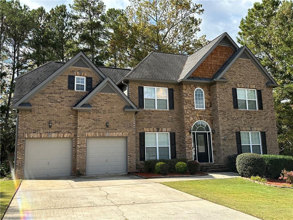 Welcome to 4401 Hampton Mill Parkway – Your Perfect Douglasville Retreat!
This stunning, Move-In Ready Home, is nestled in the sought-after Hampton Mill community a private Swim & Tennis community in Douglasville. Gourgous 4-bedroom, 2.5-bathroom home offers over 3,000 square feet of thoughtfully designed living space. Combining modern upgrades with timeless charm, this property is a true gem for those seeking comfort, convenience, and style. As you step through the front door, you’re greeted by soaring 20-foot ceilings in the entryway, setting an elegant tone that carries throughout the home. The open-concept floor plan seamlessly connects the spacious chef’s kitchen to the inviting living room, where a cozy fireplace is perfect for relaxing evenings. Rich hardwood floors flow throughout the entire home, including all four bedrooms, creating a cohesive and luxurious atmosphere.
The owner’s suite is a true sanctuary, complete with a large jetted soaking tub, a separate shower, and ample space to unwind. Full walkout basement already stubbed for electric and HVAC, offers limitless potential—whether you envision a media room, home gym, or additional living quarters. Step outside to your large, fenced backyard, perfect for gatherings, pets, or kids at play. The home also boasts new exterior paint and major systems updated for peace of mind: the HVAC and water heater were replaced just 2 years ago, and the roof is under 10 years old. For those who love an active lifestyle, this home is uniquely positioned right across the street from the community’s amenities, including a sparkling pool and tennis courts. And with easy access to I-20, Arbor Place Mall, and nearby shopping and dining, the location couldn’t be more convenient. This move-in-ready home is waiting to welcome its next owner—schedule your showing today and fall in love with everything 4401 Hampton Mill Parkway has to offer!