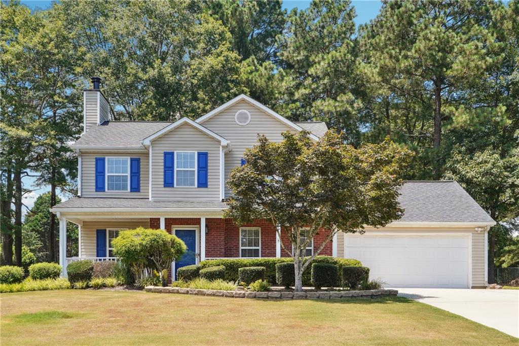 Nestled within the charming and well-established Willow Springs subdivision in Loganville, Georgia, this exquisitely upgraded 3-bedroom, 2.5-bathroom home is a true gem that seamlessly combines modern elegance with everyday functionality. Beautiful curb appeal and a lush manicured lawn is just the beginning. From the moment you step inside, you’re greeted by rich, beautiful flooring that extends across the entire main level, offering a cohesive and luxurious foundation to the spacious floor plan. The expansive family room, adorned with a cozy fireplace and the huge eat-in kitchen which provides additional seating and prep space for modern living is truly the heart of the home boasting gorgeous granite countertops, beautiful hardware, an eye-catching subway tile backsplash, updated stainless steel appliances, and custom LED light fixtures that elevate both style and efficiency. The kitchen flows effortlessly into a formal dining area—perfect for hosting gatherings or enjoying quiet family meals.
Upstairs, the owner's suite is a private retreat featuring a soaring tray ceiling, upgraded LED ceiling fan, large walk-in closet, and a spa-like en-suite bath complete with double granite vanities, sleek hardware, a separate shower and soaking tub designed for relaxation. Two generously sized secondary bedrooms share a well-appointed full bathroom, also outfitted with granite counters and modern finishes. Throughout the home, energy-efficient LED ceiling fans and lighting enhance comfort and utility, reflecting thoughtful upgrades at every turn. The half bath on the main level offers convenience for guests and is equally refined in its finishes.
The home’s exterior is just as inviting, with a large, level backyard that’s ideal for entertaining, gardening, or simply unwinding. A back patio offers the perfect space for outdoor dining or relaxing, and the two-car garage provides ample storage. Situated on a spacious lot with mature landscaping, this home enjoys a peaceful, neighborhood setting with no HOA restrictions, allowing homeowners more freedom and flexibility.
Willow Springs is conveniently located near top-rated schools, shopping centers, dining, and major highways making commutes to nearby cities like Snellville, Conyers, or even Atlanta a breeze. This home provides easy access to everything Loganville has to offer while maintaining the charm of a peaceful, well-maintained neighborhood in a sought-after community.
Whether you're looking for a stylish, move-in-ready home or a comfortable space with all the upgrades already in place, this stunning residence in Willow Springs offers the perfect combination of location, luxury, and livability—making it a true gem!