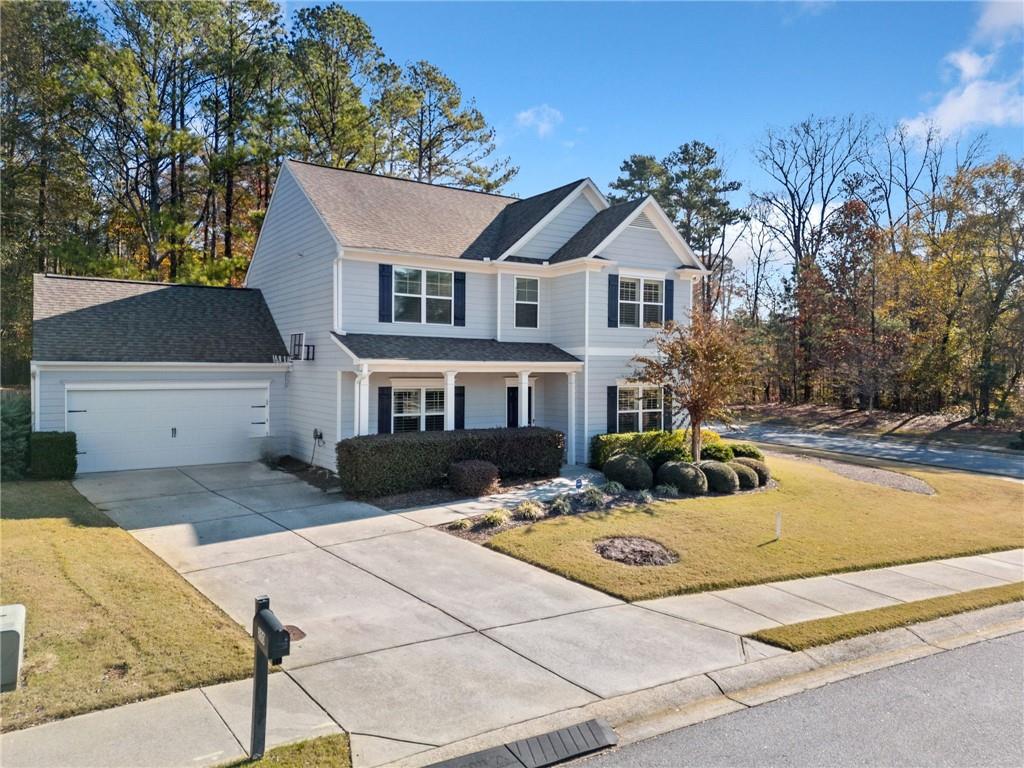 Take advantage of this fantastic opportunity to own a beautiful 4-bedroom, 3-bath home in the Haleys Mill Community only 2 miles from the Downtown Square of Woodstock & City Park. Enjoy a beautiful kitchen featuring espresso maple cabinets, a spacious kitchen island, a breakfast bar, a cozy breakfast room, granite countertops, and stainless steel appliances—all seamlessly open to the great room. The master closet and two additional upstairs bedrooms feature a CraftMaid closet system for optimal organization. Step outside to a lovely screened back porch that overlooks a private, fenced backyard, complete with a workshop/storage building. Fresh paint and new flooring throughout home.