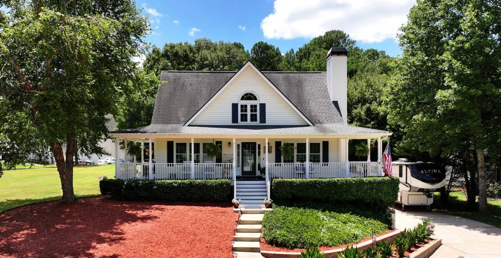 Magnificent Home, Pool & New Workshop on over an acre in one of the finest subdivisions in Dawson County! This meticulously maintained property is truly the envy of the neighborhood, boasting a wealth of recent upgrades that will take considerable time to see and appreciate. The gorgeous Kitchen features an abundance of N.C. Maple Cabinets and a picturesque view to the sizeable inground pool. The home brings forth 3-D Luxurious Vinal Plank flooring, new Fixtures and Ceiling fans throughout, Upgrades in bathrooms, built-in Shelving, and tons of Storage! The Trane (3 ton) HVAC and Water Heater are both less than three years old. There is also a Wi-Fi-enabled thermostat and Ethernet throughout the house, a Media Room in the basement, and an extra space for a fourth bedroom, office, or gym. The finished office, located in the garage area, offers a getaway to your job without ever leaving home. Exterior upgrades include modern Lighting, and lush Landscaping accompanied by thriving Palm Trees! The inviting Pool offers depths from 3 ft to 9.5 ft and sports a recent durable pool liner and pump. The property also includes a sweet garden area w/peach and cherry trees and straight from the vine, tomatoes! Leaf filters are installed on every roof line. The new workshop is a significant asset equipped with TV, Internet, LED lighting, a 12000 BTU Mini-Split/ HVAC, and 100-amp power! You will also find a 30-amp outlet dedicated for your Camper/RV with designated parking on the side of the home. This home offers an exceptional state-of-the-art lifestyle that blends comfort, functionality, and fun! Once you see it, you will not want to leave it. Come on home!