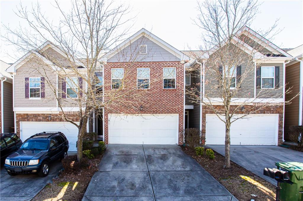 Beautiful townhome with 2-car attached garage in Sable Glen! Minutes from the airport, I-85 and I-285. Popular complex features an inviting pool, PLUS all exterior maintenance, ground maintenance, playground, clubhouse. Hardwood floors. Open concept main floor that is great for entertaining. Updated half bath on the main floor. Master bathroom with plenty of space separate bath and shower. Huge walk-in closet in Master. Two more bedrooms and separate laundry room upstairs. This is a must see!
