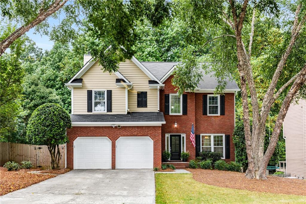 Welcome to 3976 Harmony Walk Way - where charm, comfort, and location come together beautifully! This adorable 4-bedroom, 3.5-bath home is nestled in the super desirable Concord Walk community right in the heart of Smyrna. From the moment you walk in, you'll feel the good vibes-thanks to a bright, open floor plan, cozy fireplace, and a separate dining room that's just waiting to host your next meal. The updated kitchen checks all the boxes with sleek granite countertops, stainless steel appliances, and a perfect view of your private, fenced backyard. Step outside to an amazing deck that's basically begging for summer BBQs, morning coffee, or evening chats under twinkle lights. Upstairs, the spacious primary suite is a total retreat, featuring vaulted ceilings, a spa-inspired bathroom with a soaking tub, double vanities, and a dreamy walk-in closet. Two more bedrooms offer space for kiddos, guests, or a fab home office-and there's a full bath right nearby for convenience. Need extra space? The finished basement has you covered-think movie nights, a home gym, playroom, or that hobby room you've been dreaming about. Toss in a two-car garage, tons of storage, and a location that's just 0.6 miles from the Silver Comet Trail and minutes to The Battery Atlanta, Smyrna Market Village, and major highways-and you've got yourself a total winner. Don't wait-this happy home won't last long! Come see it for yourself and fall in love.