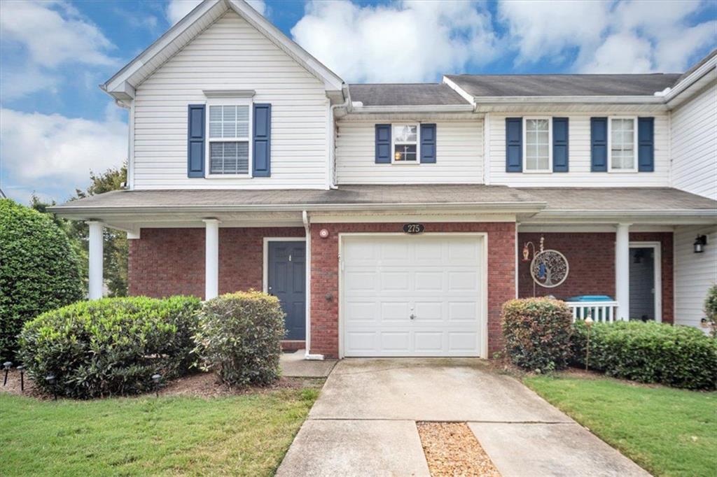 Recently updated 2 bed, 2 bath end unit townhome. Conveniently located to grocery, shopping & restaurants. Features new flooring on the main level, stairs, loft & both bathrooms. Newer appliances include Refrigerator, Stove, Dishwasher & Dryer. All appliances including Washer & Dryer stay with home. HVAC replaced in October, 2024. Water Heater replaced in 2025. Real Wood Fireplace.