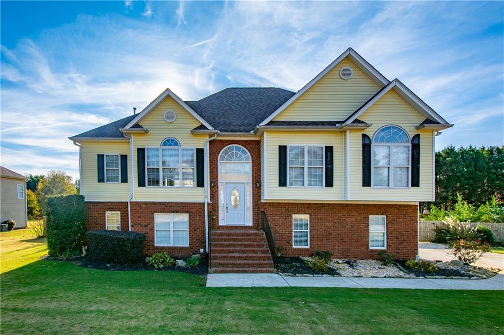 Spacious 5 Bedroom / 3 Bath Home In Flowery Branch! Upstairs, There Are Three Bedrooms And Two Full Bathrooms. Beautiful Large Windows And A Stacked Stone Fireplace You Can Enjoy All Winter Long! Downstairs, There Is A Fully Equipped Kitchen, Full Bathroom And Two Additional Bedrooms. Large Fenced Backyard With Irrigation, Stone Fire Pit, Playground And Storage Shed!