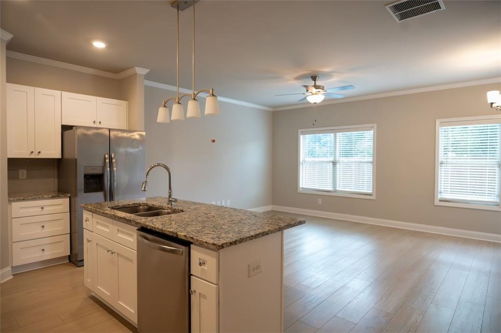 Available now! This like-new 2023-built townhome in the Preserve at Killian Hill offers modern comfort and convenience in the heart of Lilburn. Featuring 3 bedrooms, 2.5 baths, and 1,750 sq ft, this spacious home is designed with an open floor plan perfect for entertaining and everyday living.
The main level boasts a bright family room, dining area, and a contemporary kitchen with stainless steel appliances, stone countertops, and ample cabinet space. Upstairs, the owner’s suite includes a walk-in closet and spa-style bath with dual vanities, while two additional bedrooms share a full bath.
Additional highlights include an attached 2-car garage, central heating & cooling, and low-maintenance living. Located within the highly rated Gwinnett County School District, this home is just minutes from shopping, dining, and major highways for an easy commute.
Don’t miss the opportunity to lease this move-in ready townhome in a sought-after community. Schedule your tour today!