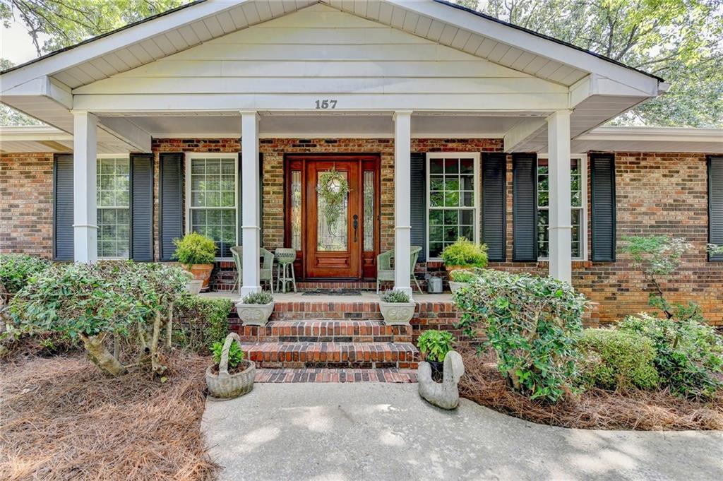Welcome to this 4 bedroom/ 2.5 ba ranch home! 4 sided brick, newer windows and NO HOA! Kitchen has been remodeled with stained cabinets, kitchen island, and granite counters. Huge flat backyard and beautiful front porch! Come check out this gem! **Up to 1% in lender incentives available on your financing if using our Preferred Lender**