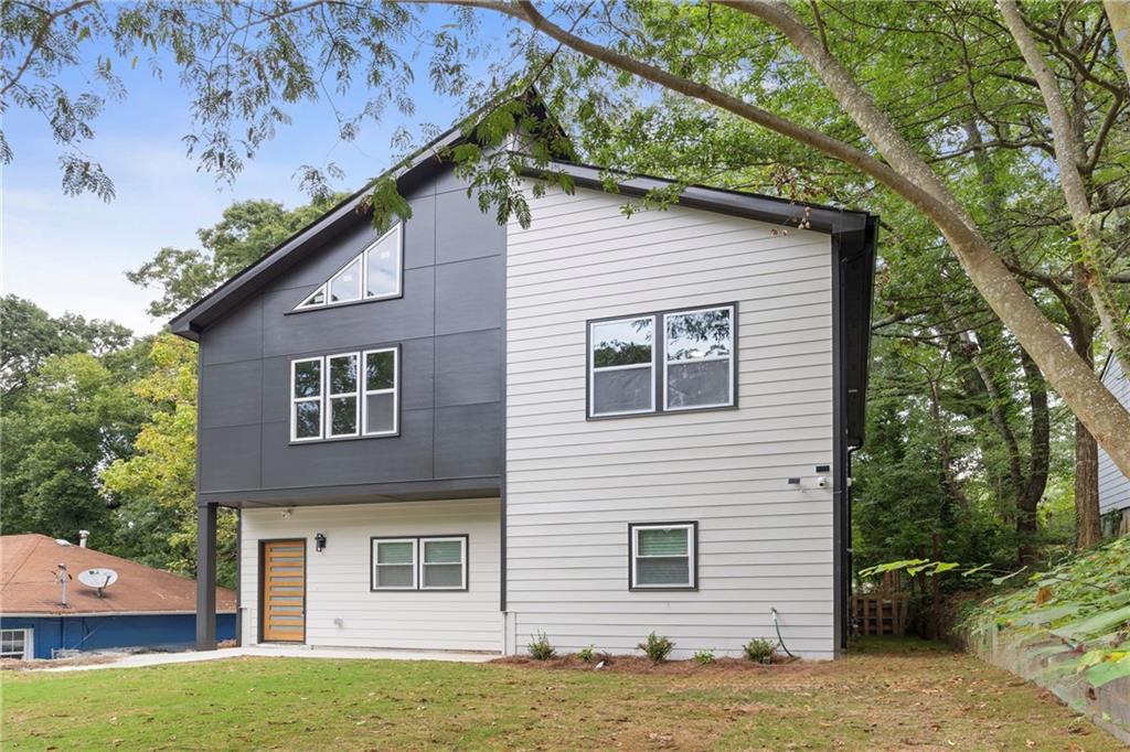 Welcome home to this beautifully renovated 4-bedroom, 3-bath home located in the highly sought-after Venetian Hills area of Atlanta. This stunning property offers modern upgrades with timeless design, just minutes from the BeltLine, Downtown Atlanta, Mercedes-Benz Stadium, and the vibrant dining and shopping of Lee + White and West End. Inside, you'll find an open-concept floor plan designed for both style and function. The gourmet kitchen features granite countertops, brand-new stainless steel appliances, and custom cabinetry, all flowing seamlessly into the dining and living areas perfect for entertaining or everyday living. Each of the three full bathrooms showcases designer tile work, with a spa-inspired primary bath offering a large tiled shower, double vanity, and oversized walk-in closet. The main level includes a versatile bedroom that can be used as a guest room or a private home office, providing flexibility to fit your lifestyle. Upstairs, a spacious laundry room adds convenience, while generous secondary bedrooms offer plenty of space for family or guests. With its blend of modern finishes, abundant natural light, and thoughtful renovations, this home is move-in ready and built for today's lifestyle. Don't miss this incredible opportunity to own a fully updated home in one of Atlanta's fastest-growing communities where history meets modern living and convenience is at your doorstep.