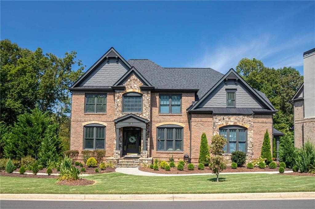 This impressive 7-bedroom, 5-bathroom residence offers nearly 4,000 square feet of elegant living space tucked away in the coveted Polo Golf & Country Club in Forsyth County. Built in 2003 and recently updated with classic finishes throughout, this stately brick home strikes the perfect balance of timeless architecture, modern comfort, and resort-style amenities with mature landscaping and plenty of charm. The finished basement and main level boast multiple gathering spaces, formal and casual, plus flexibility for entertainment, guest suite, or even a home office. The well-proportioned rooms and great natural light throughout will leave you feeling refreshed. As a part of Polo Golf & Country Club, residents enjoy access to top-tier golf amenities, trails, social amenities, and a thriving community. Highly rated and sought after Forsyth County schools just add to the appeal. Schedule and appointment today to see your dream home!